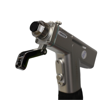 Close-up of a metal tool or device on a white background