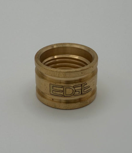 Brass welding cup adapter with engraved EDGE logo on plain background