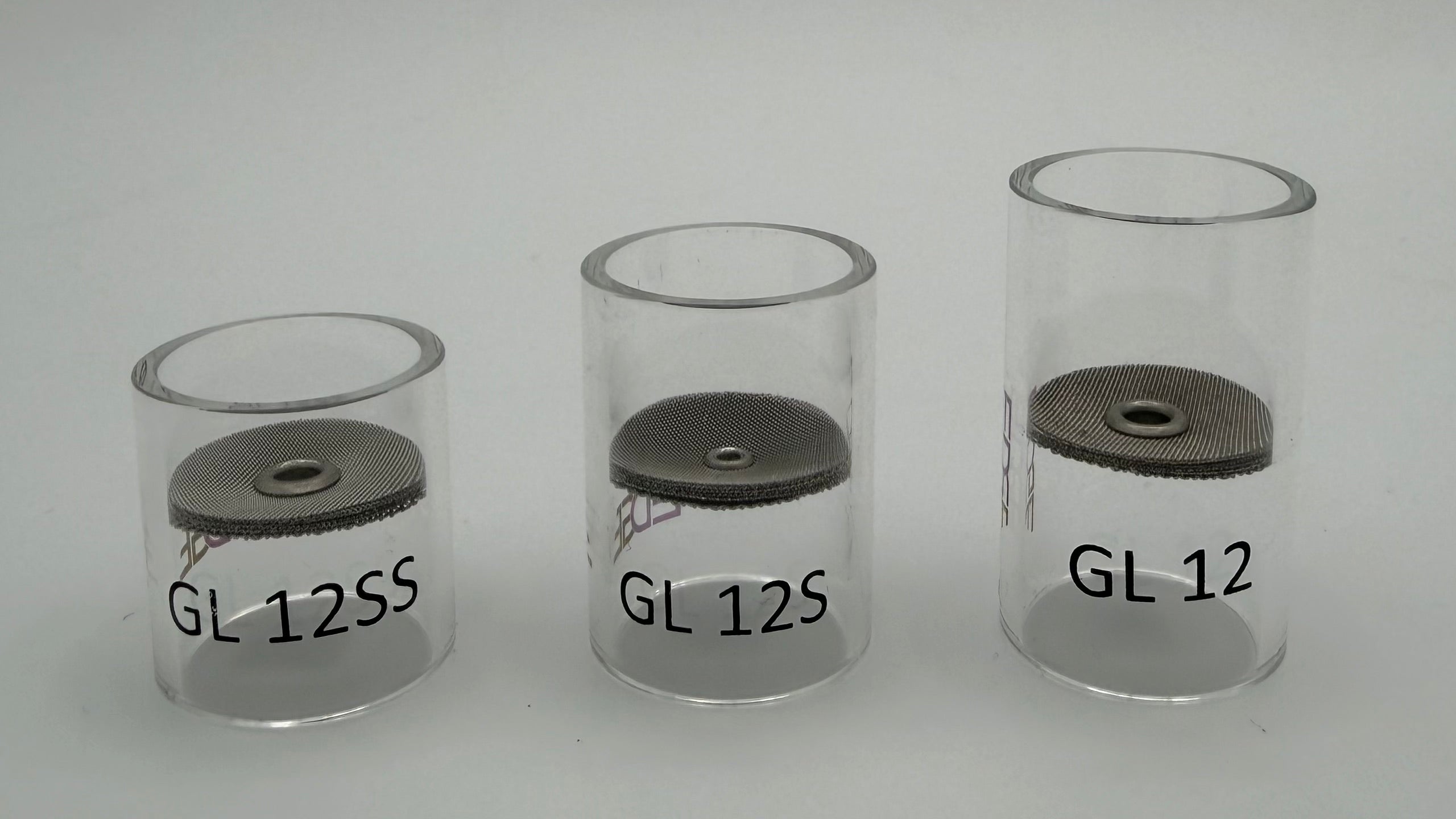 Three clear glass TIG welding cups labeled GL 12SS, GL 12S, and GL 12 on a white background.
