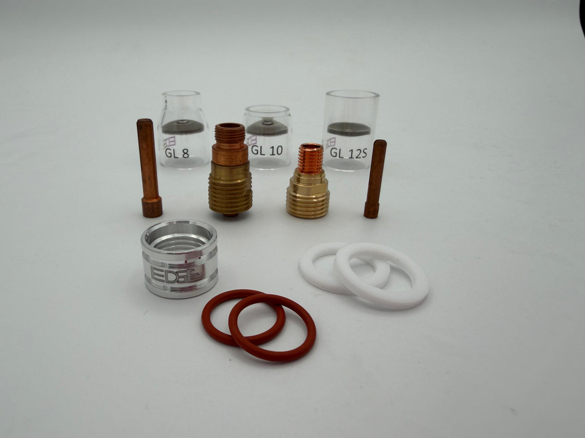 TIG welding gas lens kit with glass cups, collets, gas lens bodies, and O-rings on white background