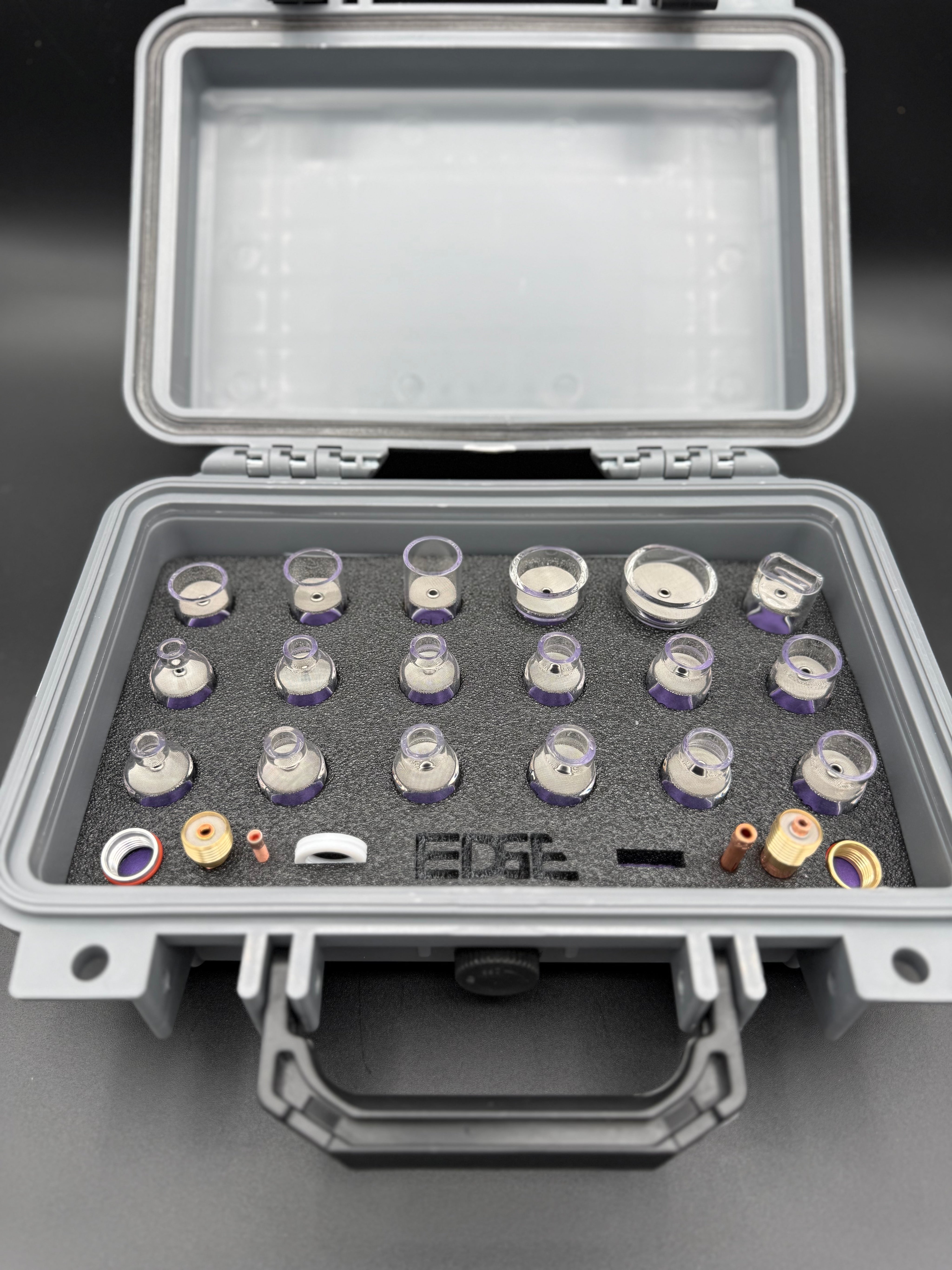 Protective case with assorted welding cups and accessories organized in foam insert