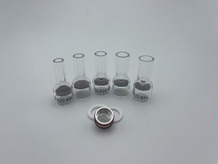 Set of clear glass TIG welding cups with O-rings and adapter on white background