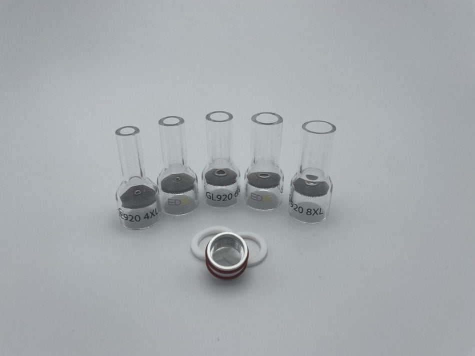 Set of clear glass TIG welding cups with O-rings and adapter on white background
