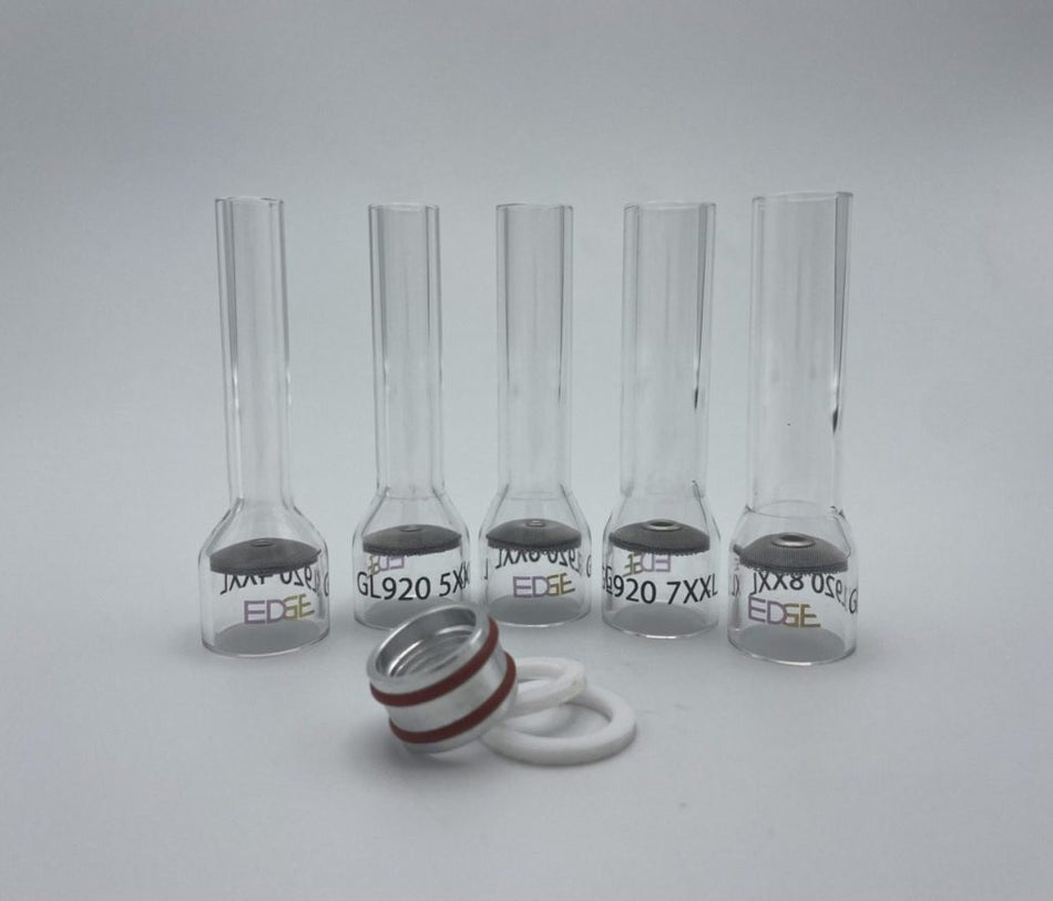Clear glass welding cups with metal screens and o-rings on a white background