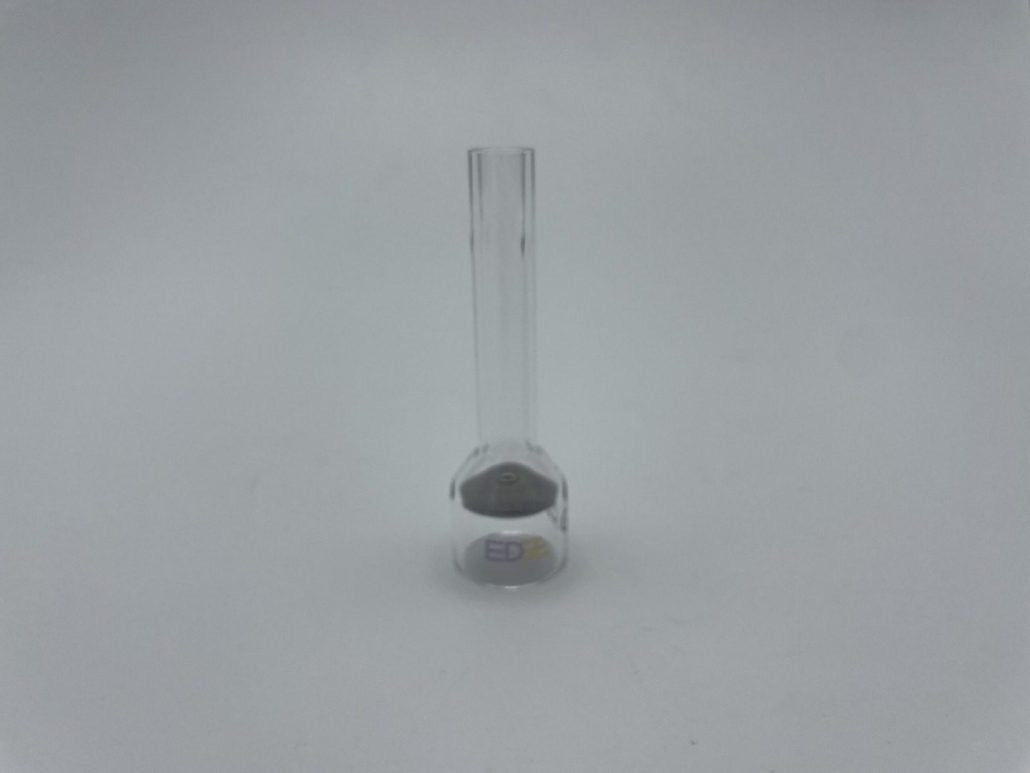 Clear glass welding cup with cylindrical neck on plain white background