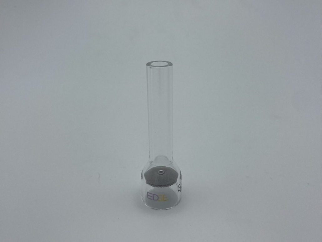 Clear quartz welding cup on plain background, TIG welding accessory