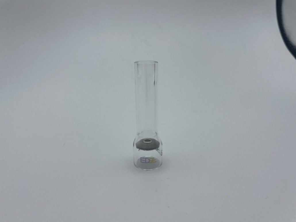 Clear glass welding cup for TIG welding on white background