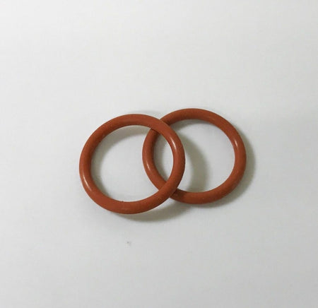 Two brown silicone O-rings for welding equipment on a white background.
