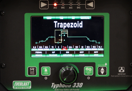 Typhoon 330 welding machine digital control panel displaying trapezoid wave setting.